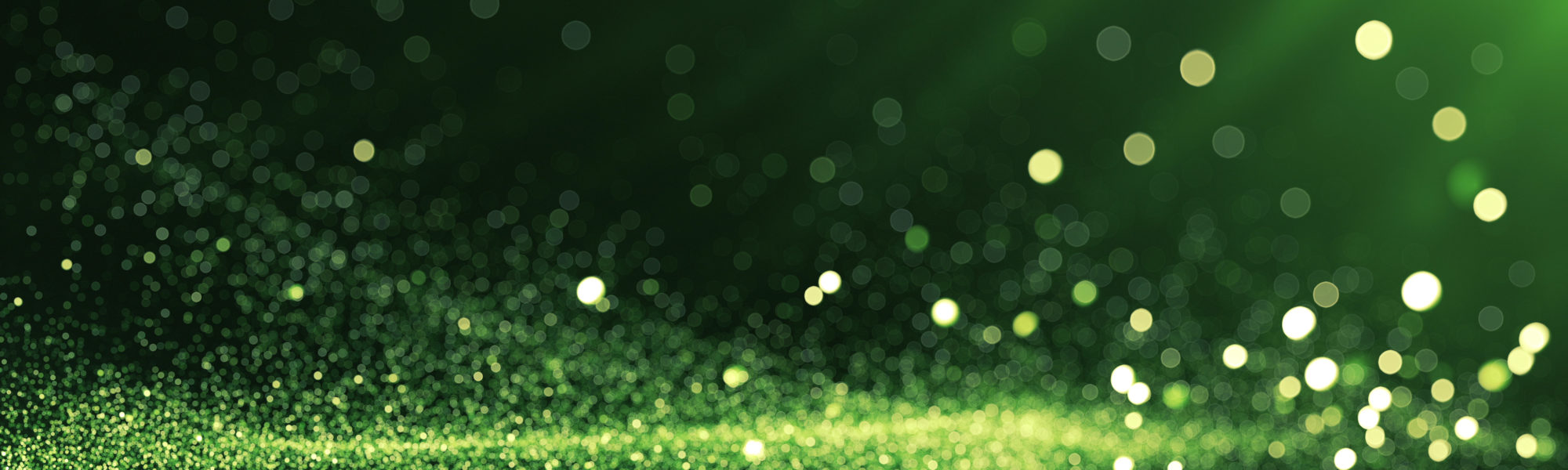 Green Defocused Particles Background