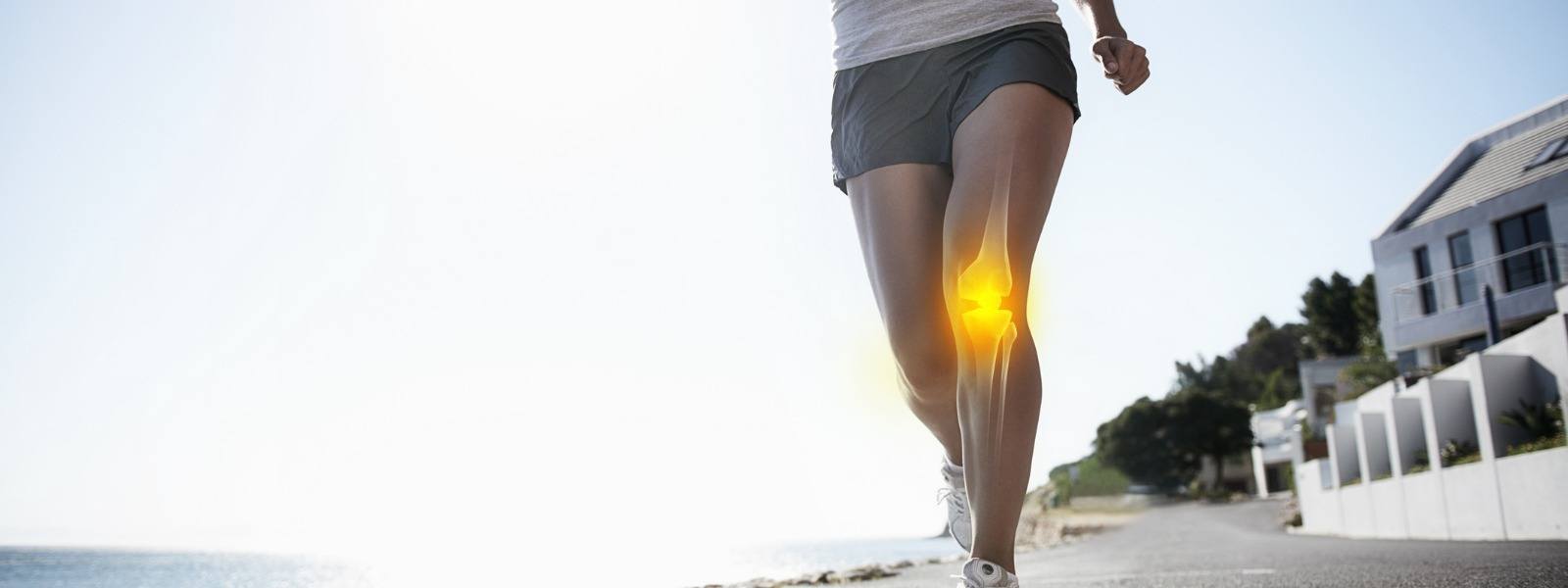 Woman running with knee pain