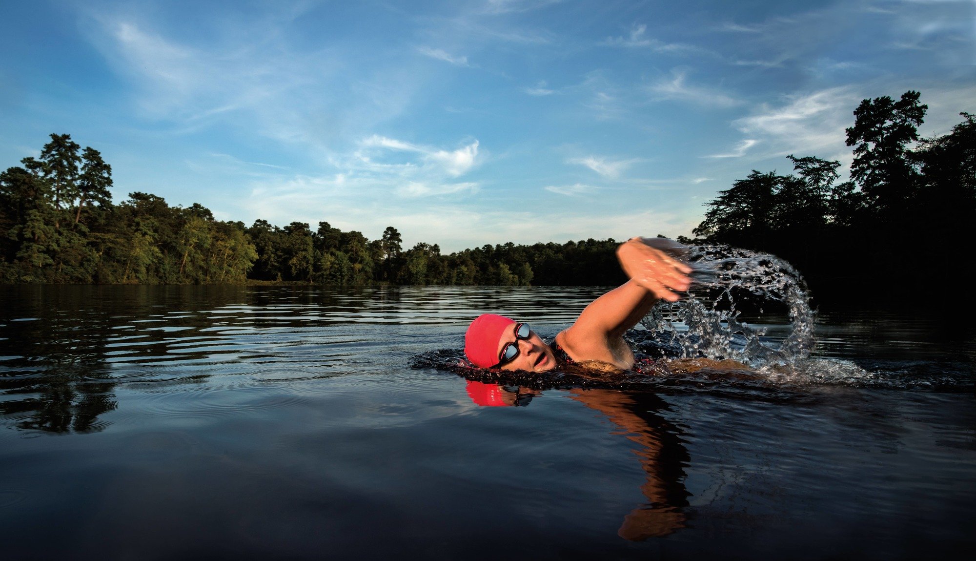 Tamie swimming in a large pond
